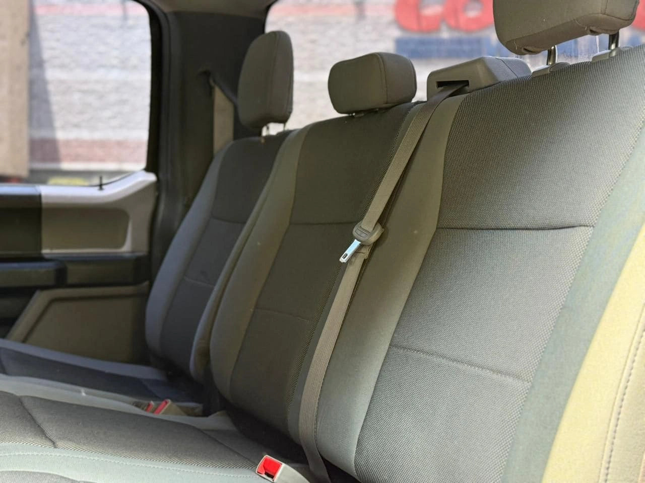 Camioneta pickup Ford F150 XL 2018 de la marca Carmexio CDMX, vista lateral con detalles del vehículo en color azul.