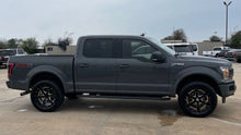 Camioneta Ford F150 XLT 2018 de Preventas Carmexio en una imagen que muestra el vehículo en un entorno exterior.