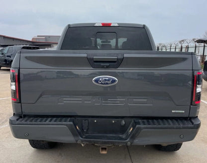 Camión Ford F150 XLT 2018 de Preventas Carmexio, vista lateral del pickup en color azul con detalles del vehículo.